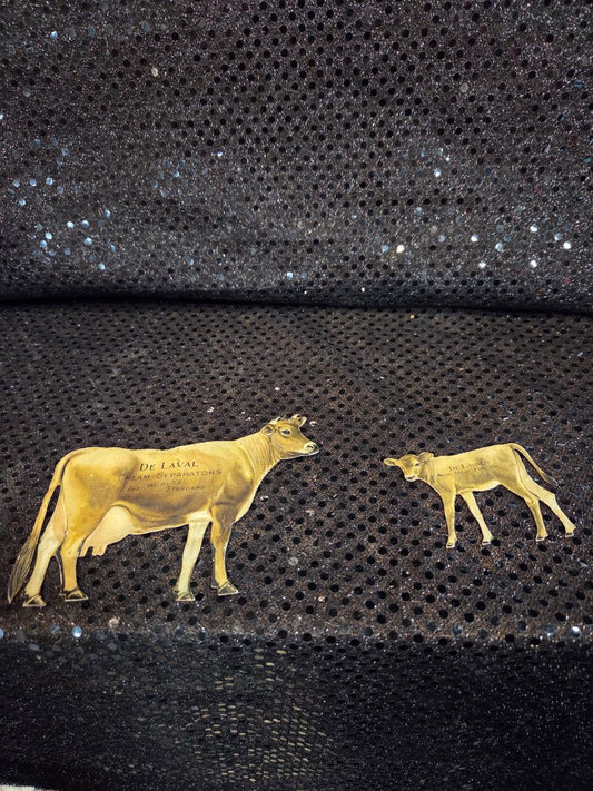 1920's DeLaval Jersey Cow Tin Dairy Advertising large and small cow