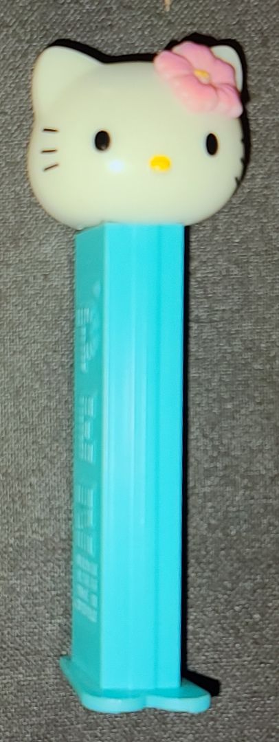 Vintage Hello Kitty Pez Dispenser Hawaiian Flower