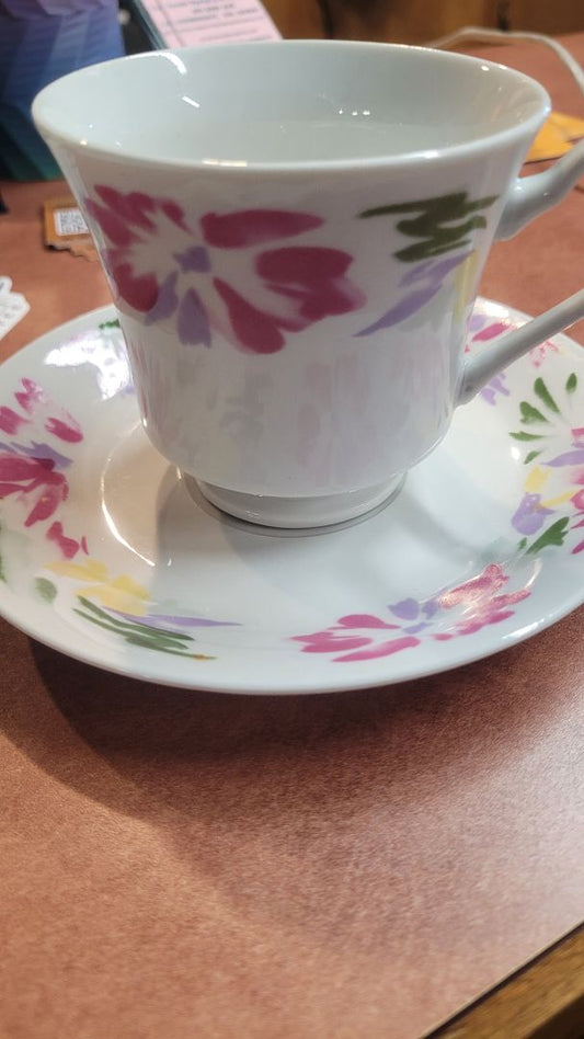Hand painted cup and saucer