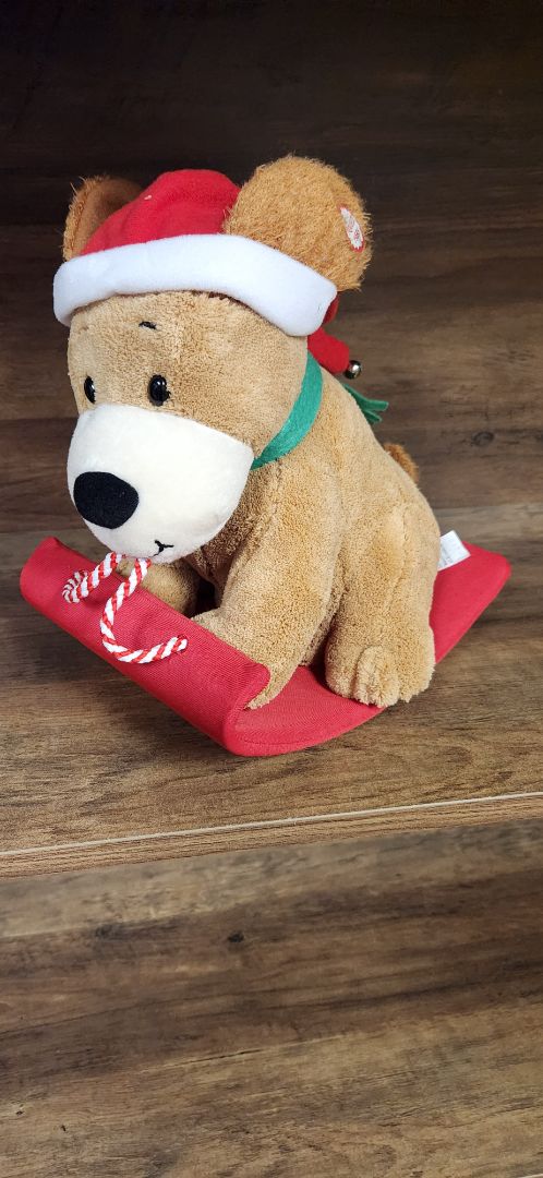 Hallmark Plush rocking dog on a sled battery operated