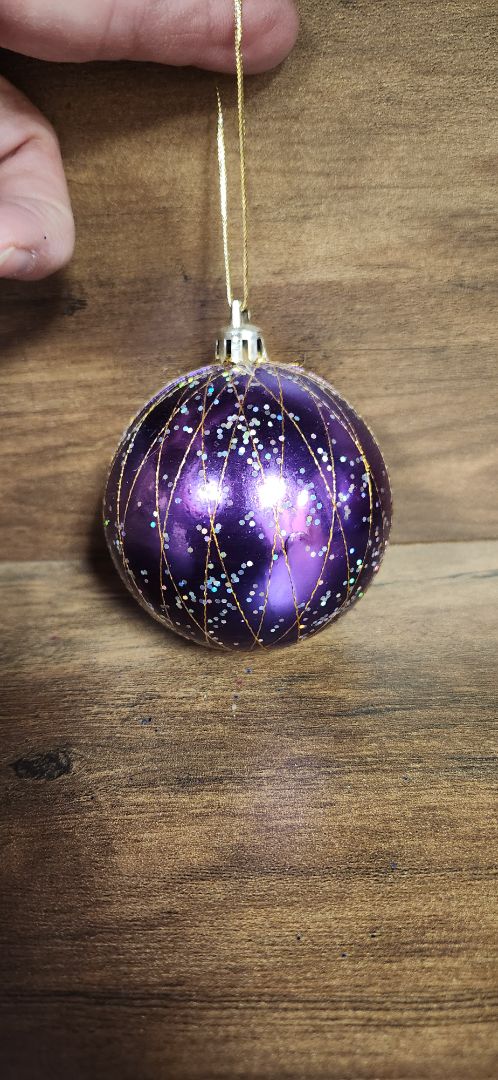 purple with gold string pattern