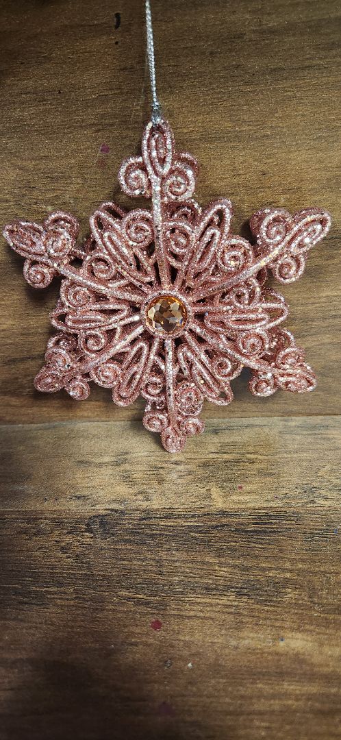 Pink glitter snowflake with stone