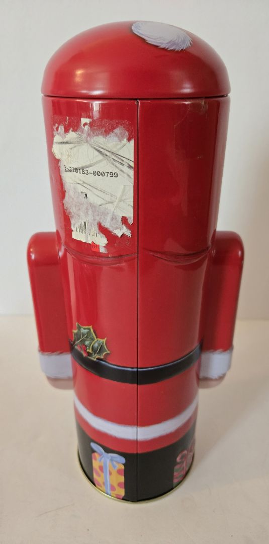Standing Holiday Santa-shaped tin