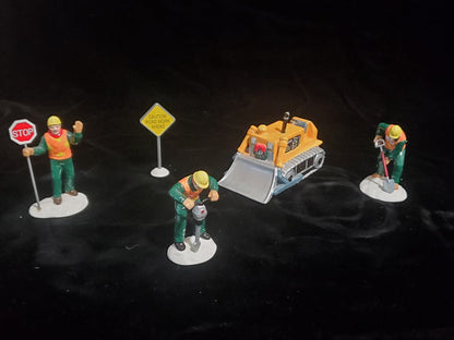 Snow village by Studio 56 Men at work