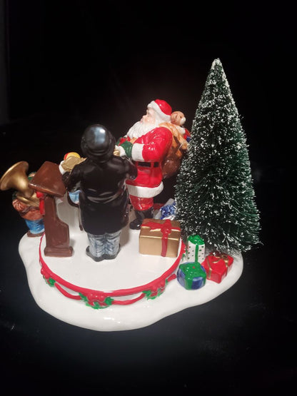 Snow village by Studio 56 Santa clause comes to town 1997