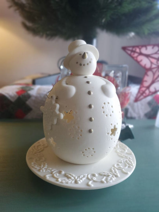 At home america porcelain snowman candle holder