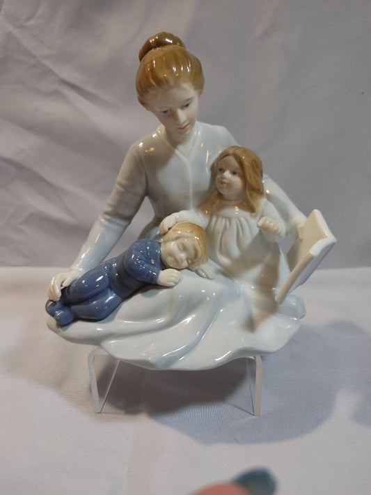 Blue Pastels Avon 1984 Avon "A Mother's Touch" porcelain collectible figurine, 5" X 6"