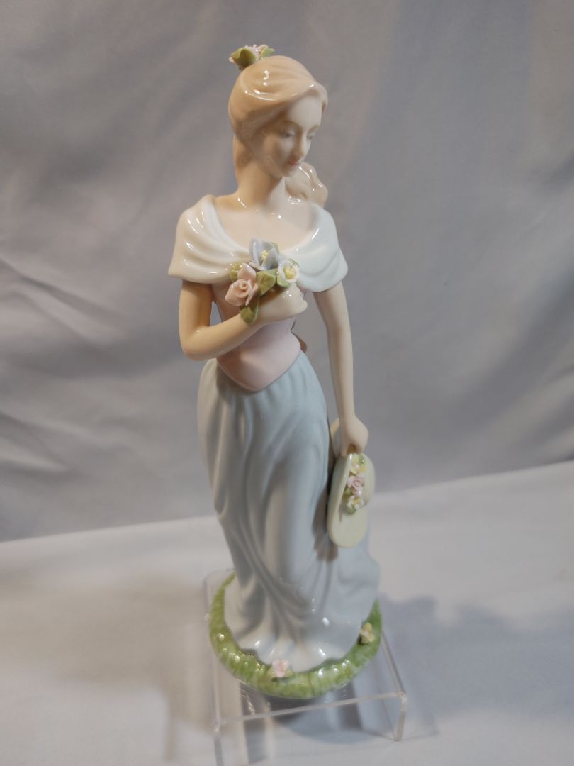 Blue, Pink, White Pastels Avon Avon Moments & Memories "A Spring Stroll" porcelain figurine Figurine, 9"