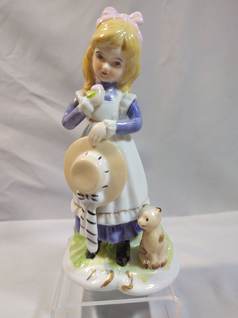 Porcelain girl with a hat in her hand and a cat figurine, Arnart Imports, 6"