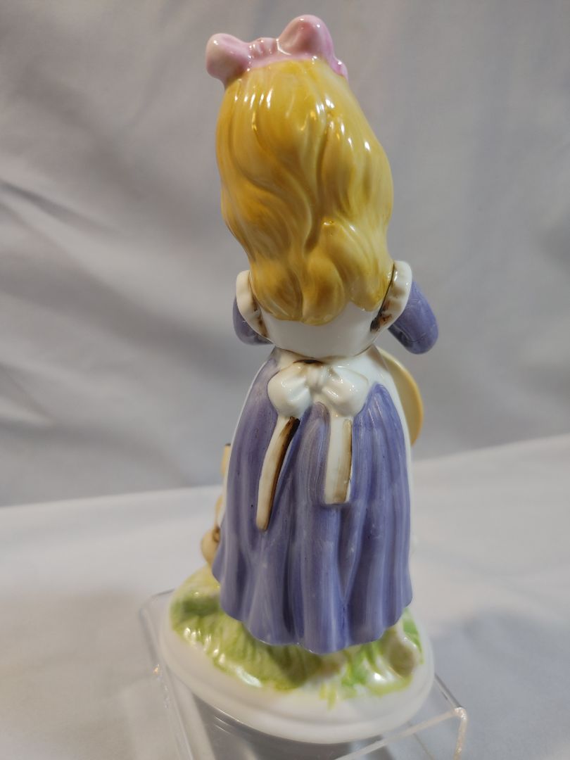 Porcelain girl with a hat in her hand and a cat figurine, Arnart Imports, 6"