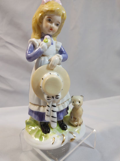 Porcelain girl with a hat in her hand and a cat figurine, Arnart Imports, 6"
