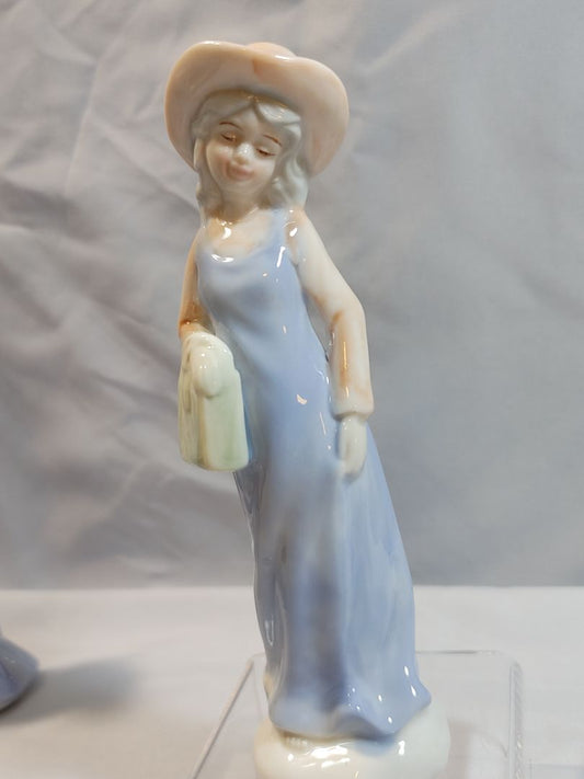 Porcelain Figurine girl with handbag & hat in blue dress, 6.5"