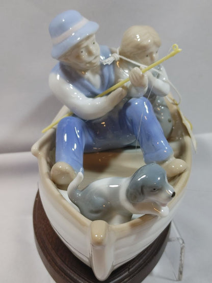 Pastels Paul Sabastian-Mieco Father/Grandfather, child & dog fishing boat figurine, 5"