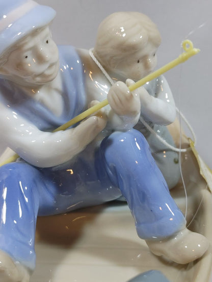 Pastels Paul Sabastian-Mieco Father/Grandfather, child & dog fishing boat figurine, 5"