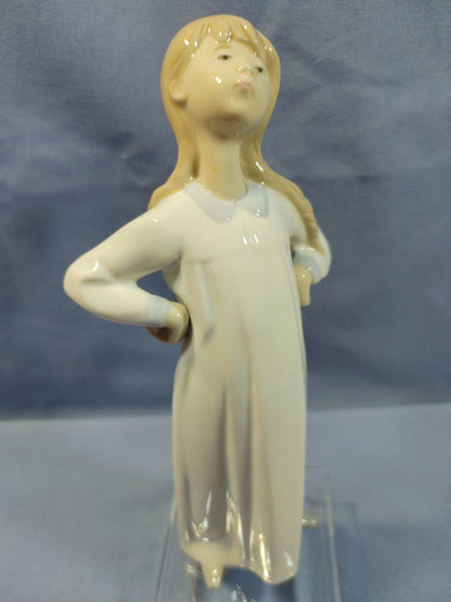 Lladro 1984 Porcelain Figurine, #4872 “Girl Stretching”, 8"