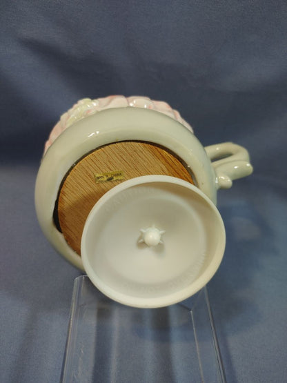Dog with sleeping puppy Ceramic Musicbox, 5"