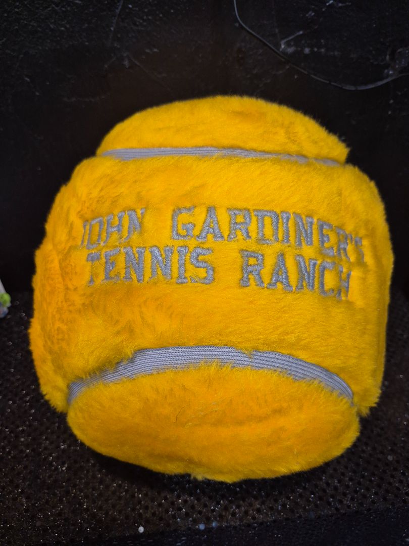 Mustard Yellow Vintage John Gardiner's Tennis Ranch Novelty Tennis Ball Shaped Pillow, 9"