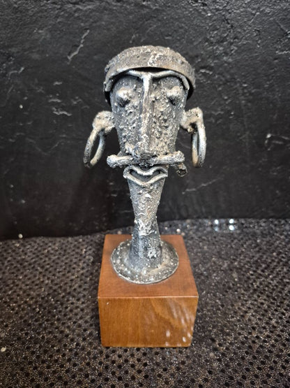 Metal Sculpture on Wooden Base