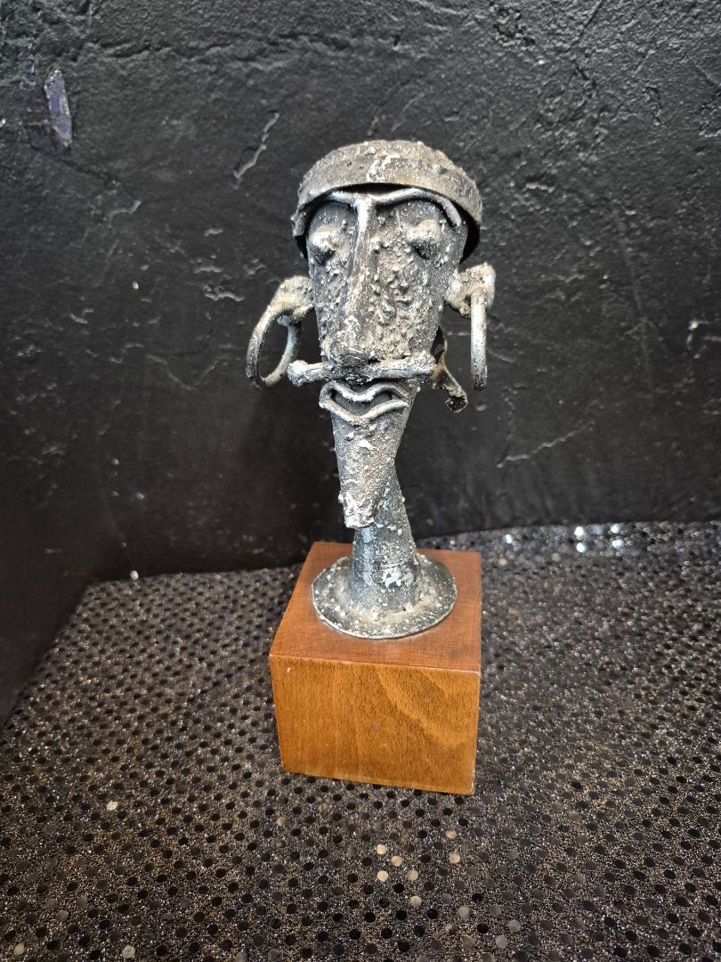 Metal Sculpture on Wooden Base