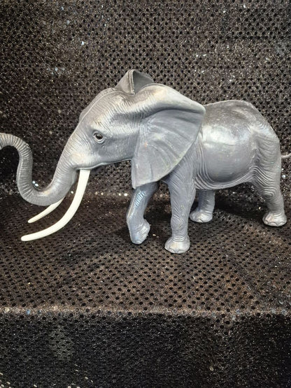 Grey Vintage Plastic Elephant Figurine Toy, 4" × 12" × 7"