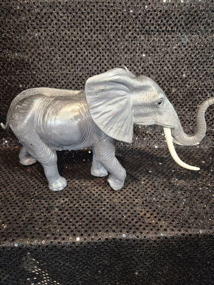 Grey Vintage Plastic Elephant Figurine Toy, 4" × 12" × 7"