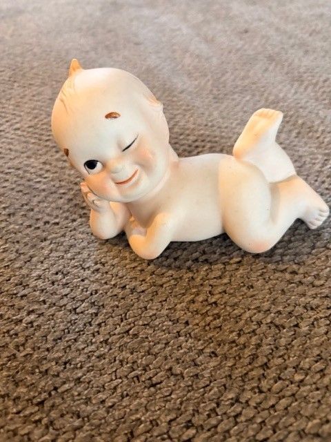 Vintage Bisque Piano Baby Figurine