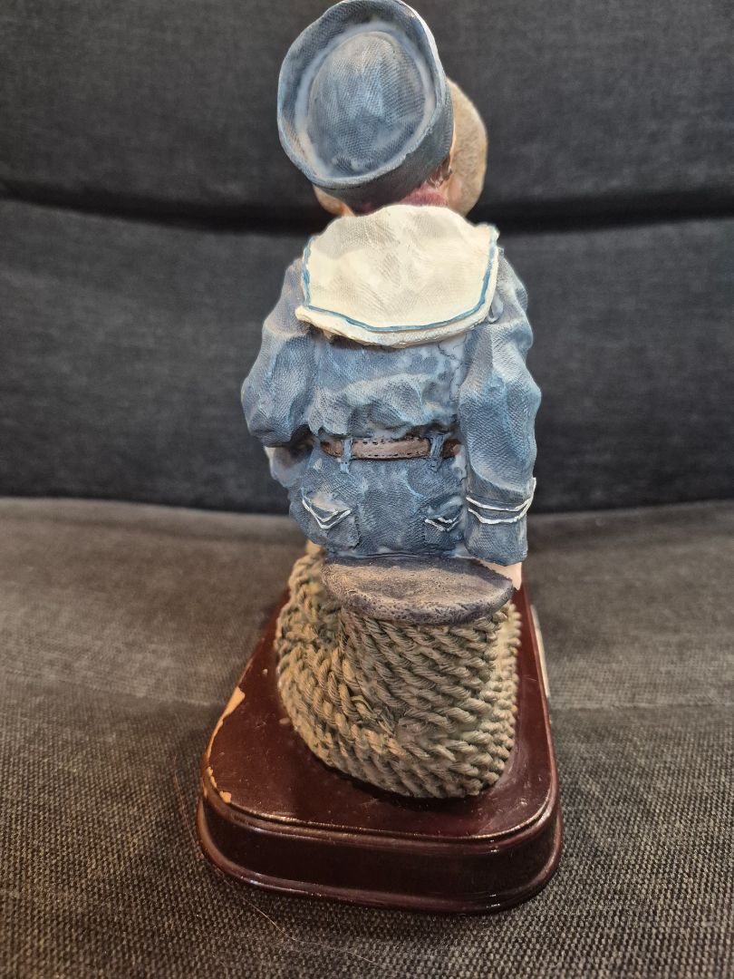Meerchi Sailor boy & girl kissing on rope seats, 7" x 8"