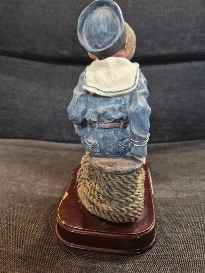 Meerchi Sailor boy & girl kissing on rope seats, 7" x 8"