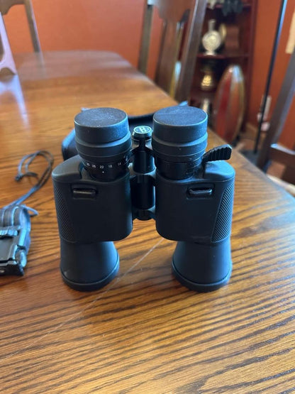 Bushnell Binoculars 10x-30x50 197 feet at 1000 yds
