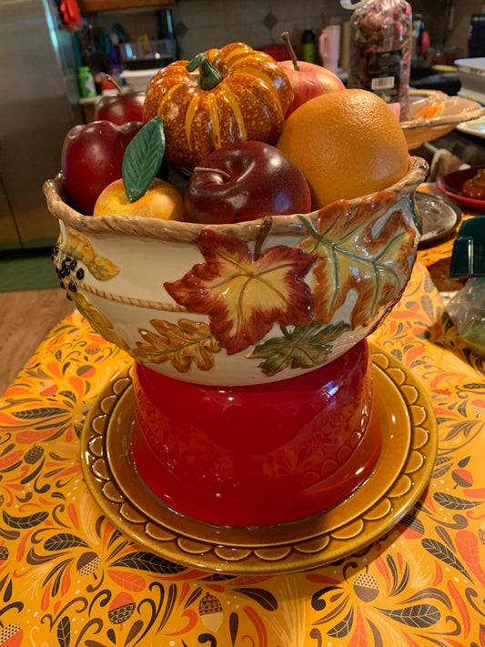 Red/fall colors  Center with red and fall leaf bowls filled with fruit