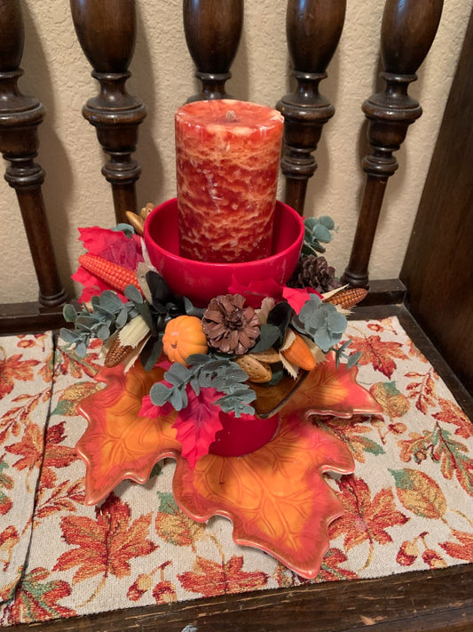 Orange red  Centerpiece orange leaf plate red bowl with candle on top