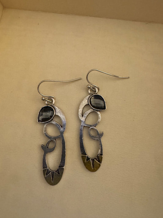 Silvertone cutout blue accent dangle earrings