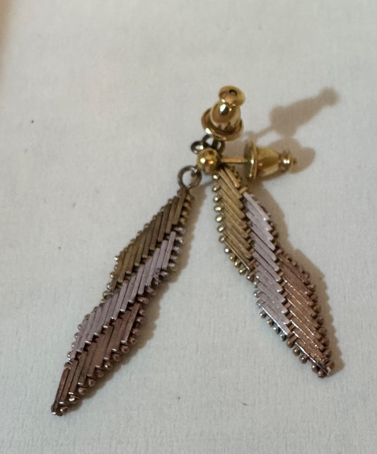 Gold tone silver tone stud earrings