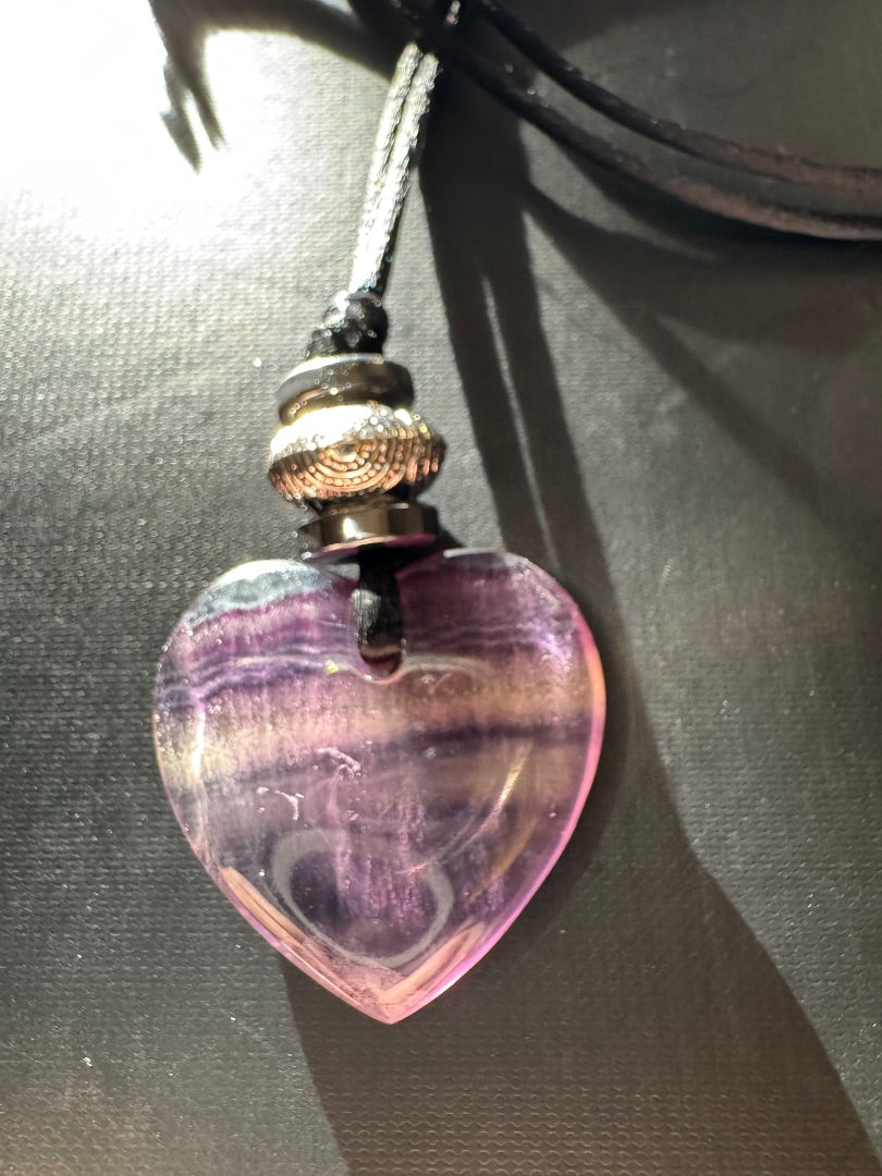 Amethyst color heart on a cord necklace