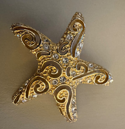Goldtone cutout starfish brooch