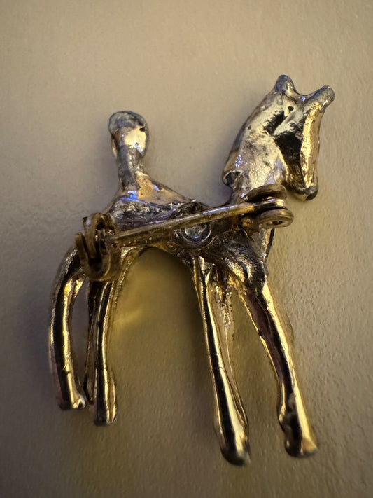 Sm black silvertone horse brooch