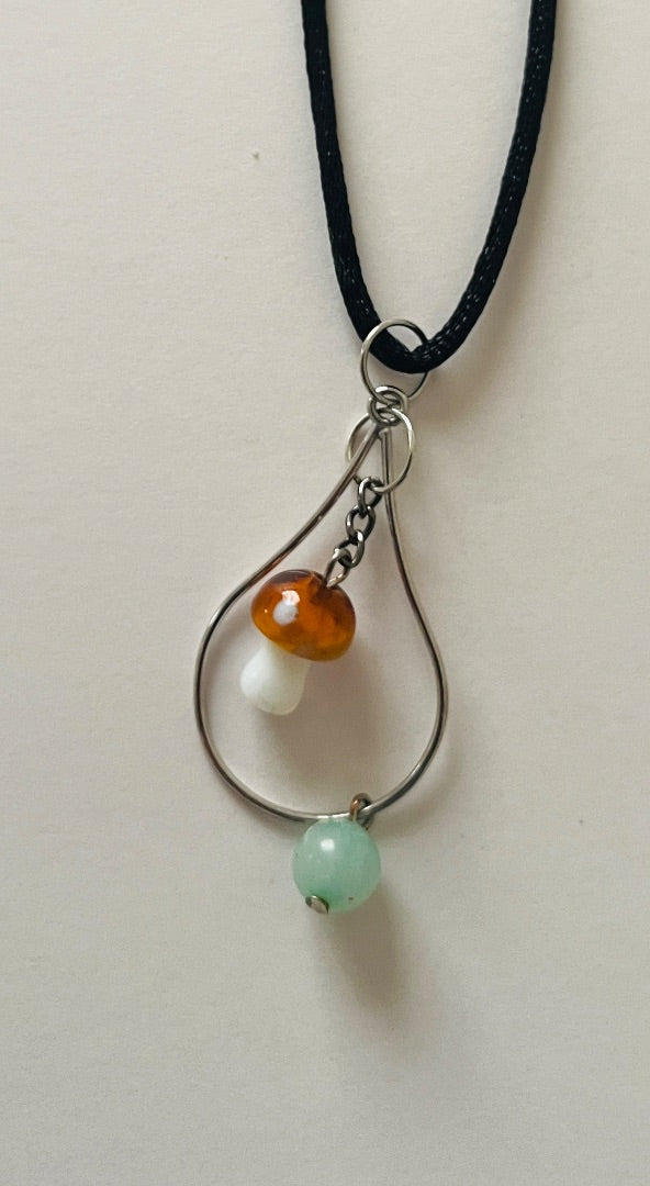 Adjustable Cord with Glass Mushroom dangling on tear drop with glass bead. Jewelry