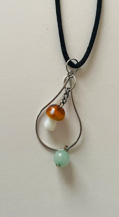 Adjustable Cord with Glass Mushroom dangling on tear drop with glass bead. Jewelry