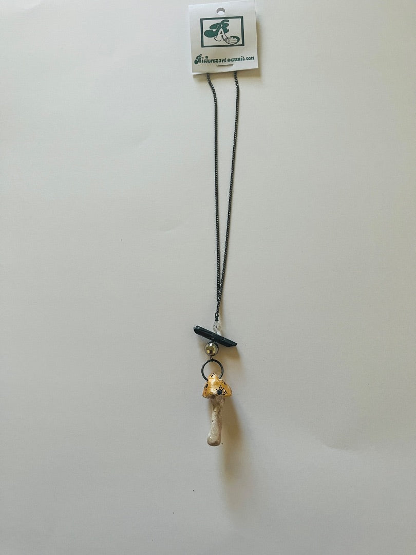 Black Spear with 2 Glass Beads attached to a Kiln Fired Mushroom Necklace. Jewelry