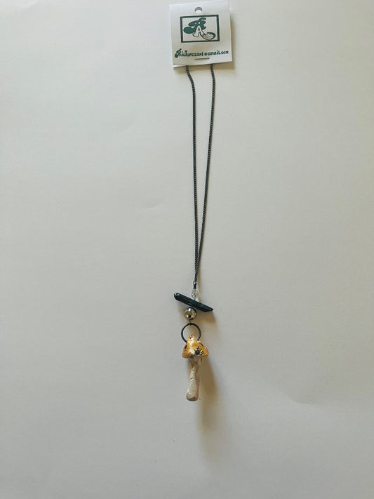 Black Spear with 2 Glass Beads attached to a Kiln Fired Mushroom Necklace. Jewelry