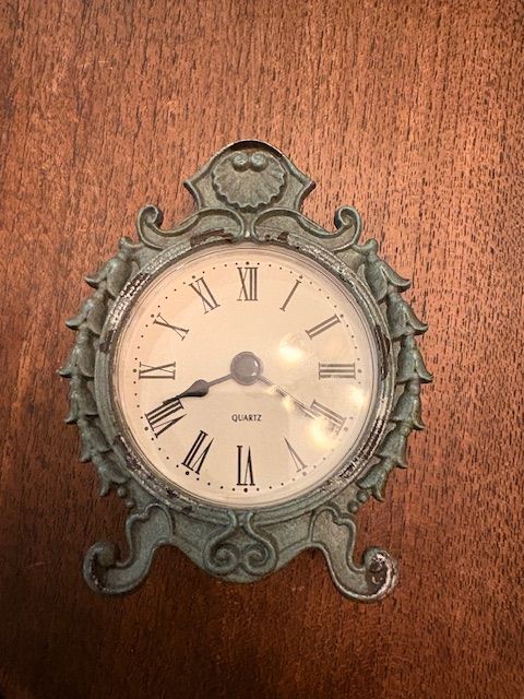 Small ornate Victorian/Baroque style mini clock