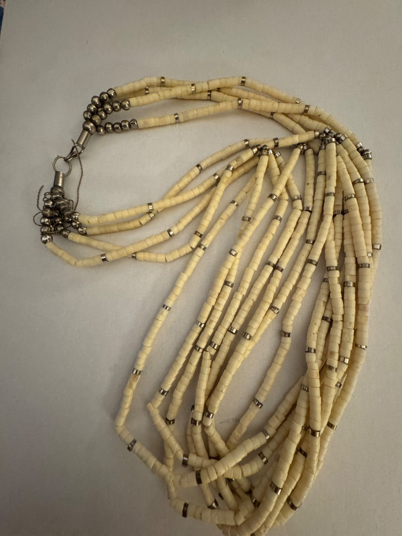 Cream multi strand necklace
