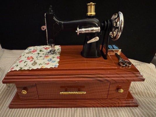 Sewing machine music box