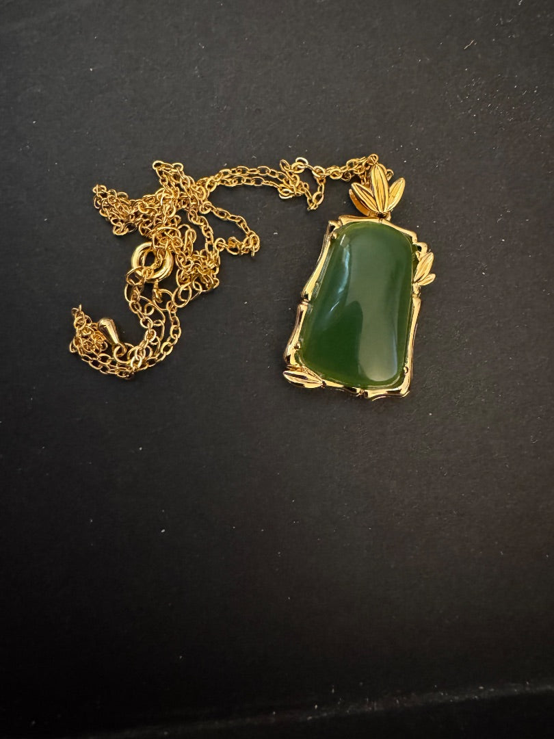 Green goldtone necklace