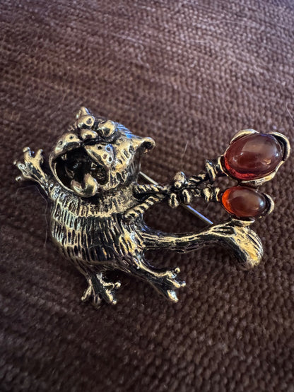 Stressed cat holding ballons brooch
