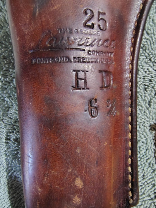 tan George Lawrence CO leather holster, 6 3/4 - 25
