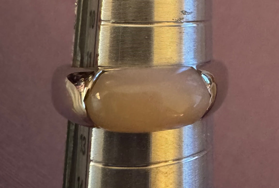 Pink east west setting ring 6