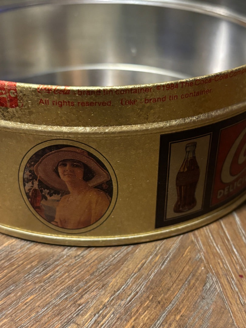 “Gibson girl” advertising tin