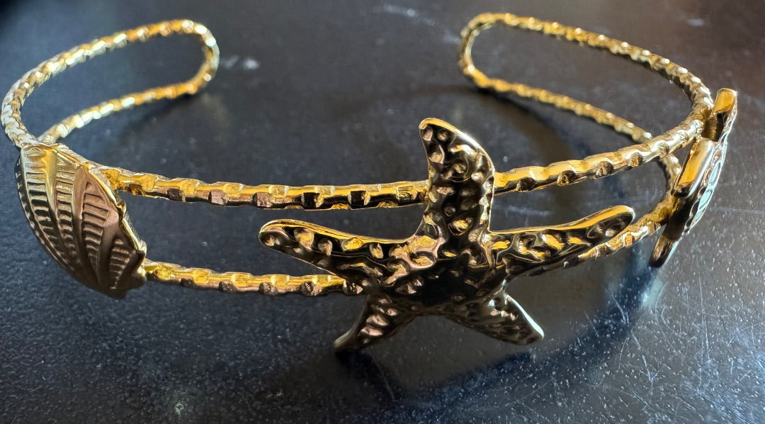 Sea theme gold tone cuff bracelet