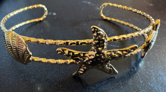 Sea theme gold tone cuff bracelet
